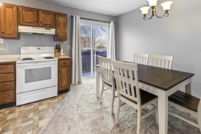 kitchen with an inviting chandelier and white range with electric cooktop