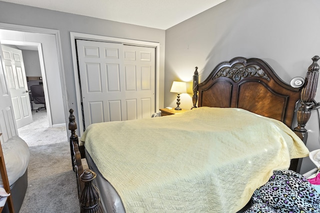 carpeted bedroom featuring a closet