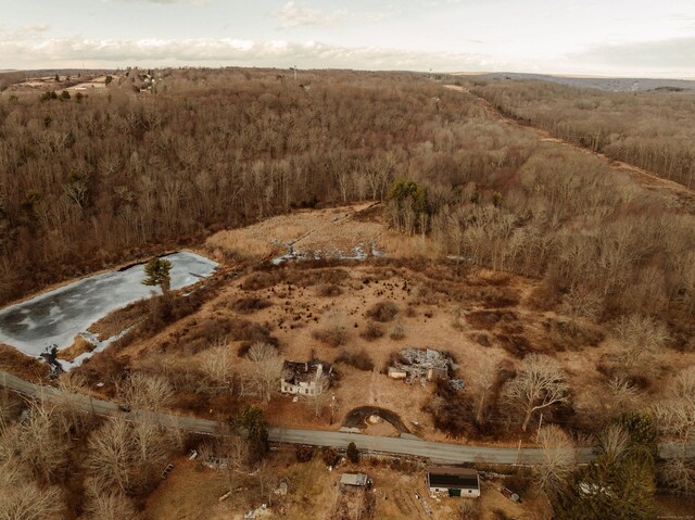 birds eye view of property featuring a rural view