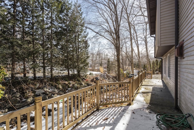 view of snow covered deck