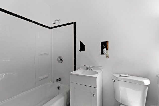 full bathroom featuring vanity, tub / shower combination, and toilet