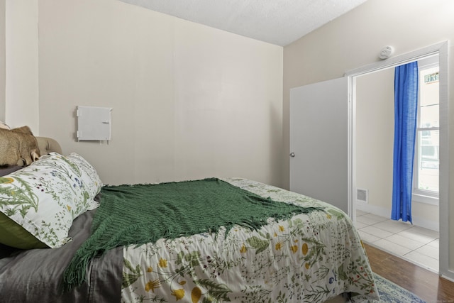 bedroom featuring light hardwood / wood-style flooring