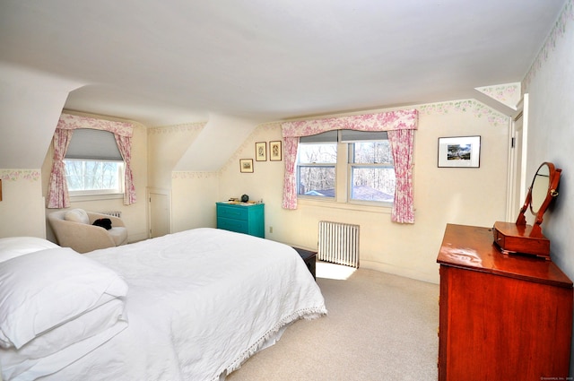 bedroom featuring carpet flooring and radiator