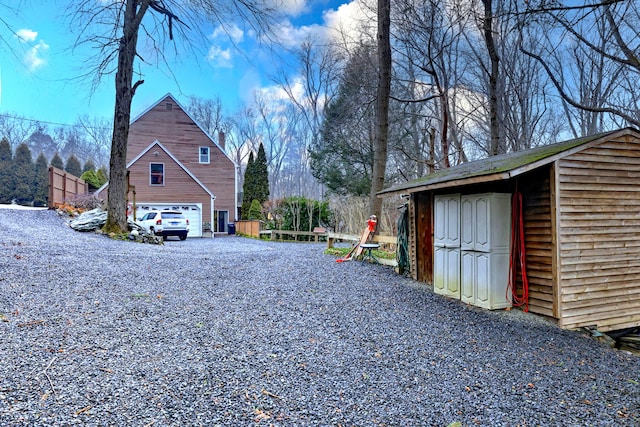 view of home's exterior featuring an outbuilding