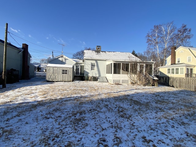 view of snow covered house