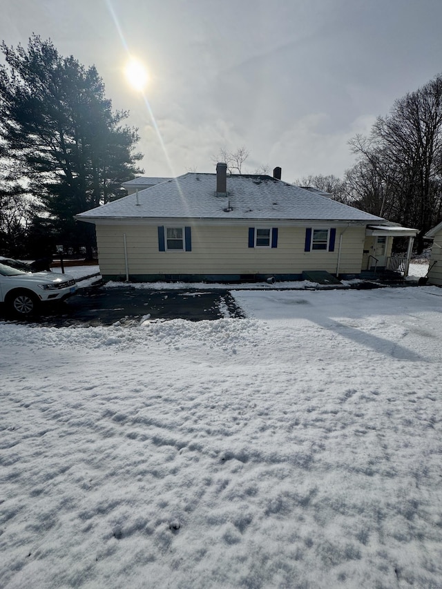 view of snow covered property