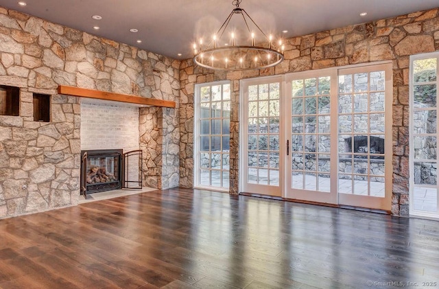 unfurnished living room featuring dark wood-type flooring