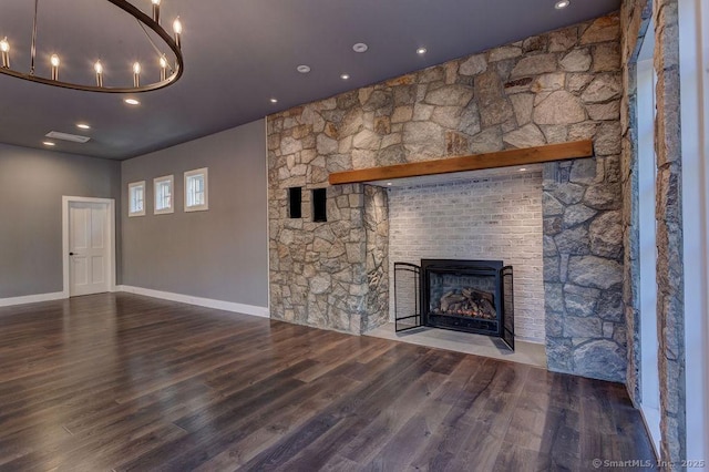 unfurnished living room with hardwood / wood-style flooring