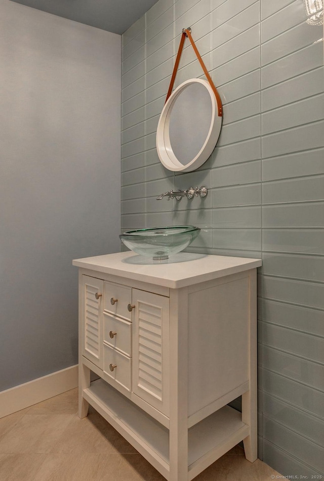 bathroom featuring vanity and tile patterned flooring