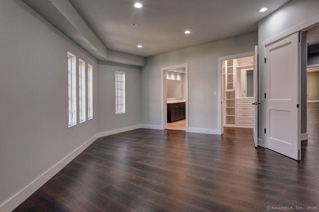 empty room featuring dark hardwood / wood-style floors