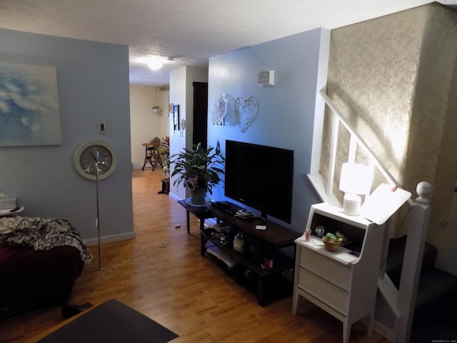 living room with wood-type flooring