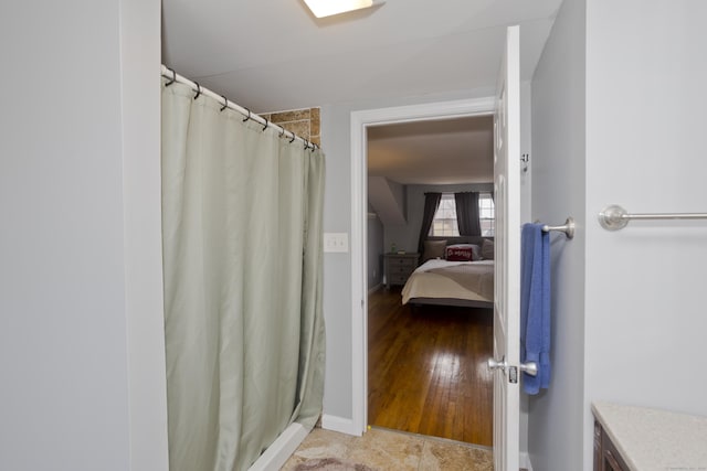 bathroom featuring vanity and walk in shower