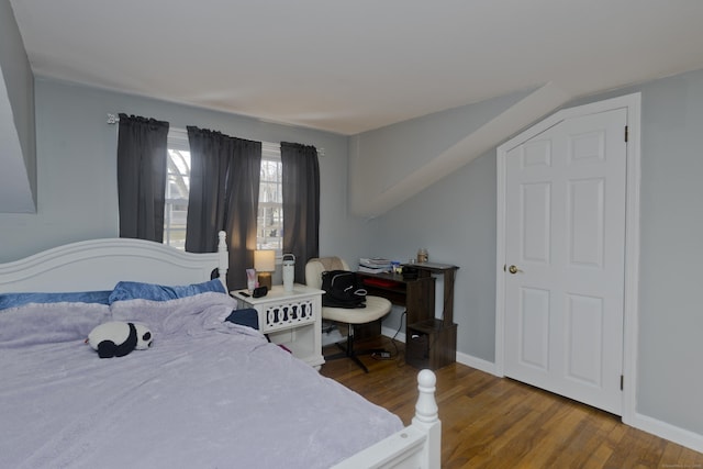 bedroom featuring hardwood / wood-style flooring