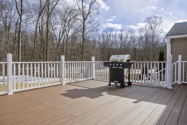 deck featuring a grill