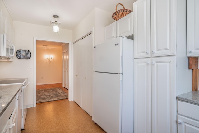 kitchen with white cabinetry, white appliances, and decorative light fixtures