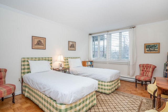 bedroom with crown molding, a baseboard heating unit, and parquet floors