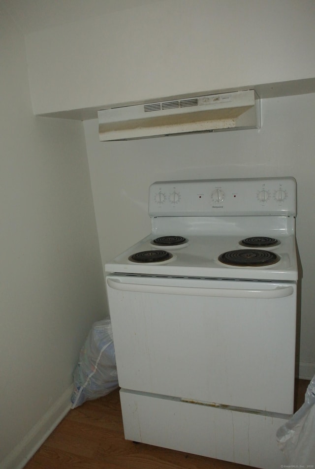 room details with under cabinet range hood, baseboards, white electric range, and wood finished floors