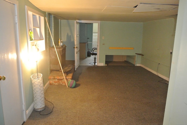 basement with carpet flooring