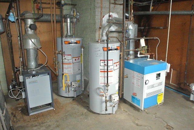 utility room featuring a heating unit and water heater