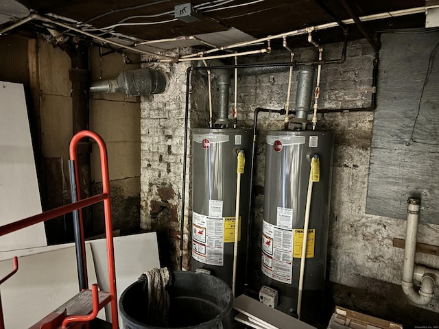 utility room with gas water heater