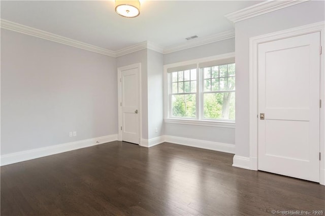 unfurnished room with crown molding and dark hardwood / wood-style flooring