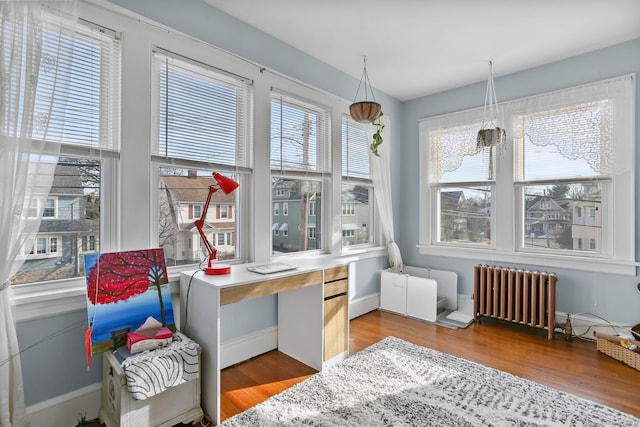 interior space featuring radiator and radiator heating unit