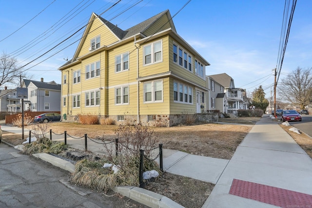 view of property exterior featuring a residential view