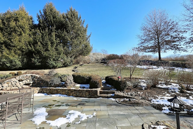 view of snow covered patio