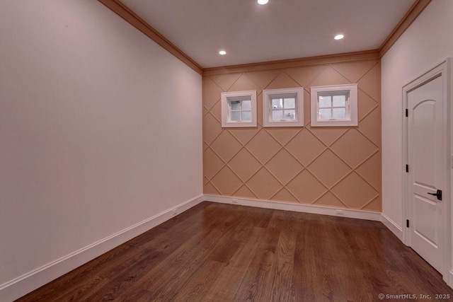unfurnished room with crown molding and dark hardwood / wood-style floors