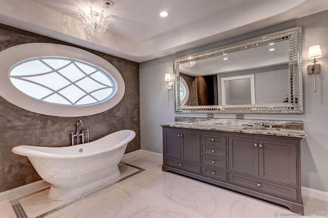 bathroom featuring vanity and a bathtub