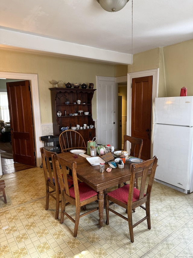 dining space with light floors