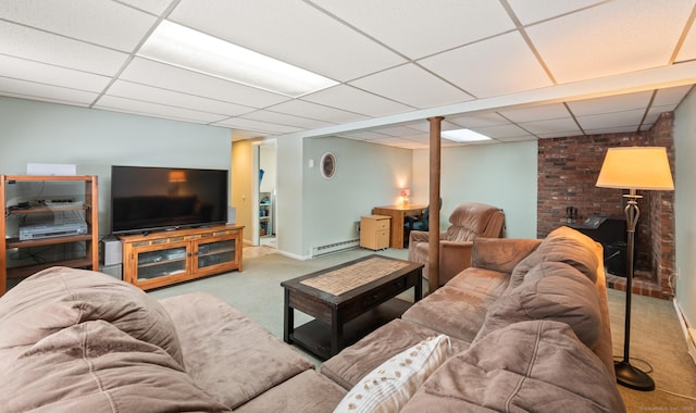 carpeted living room featuring a baseboard radiator and a paneled ceiling