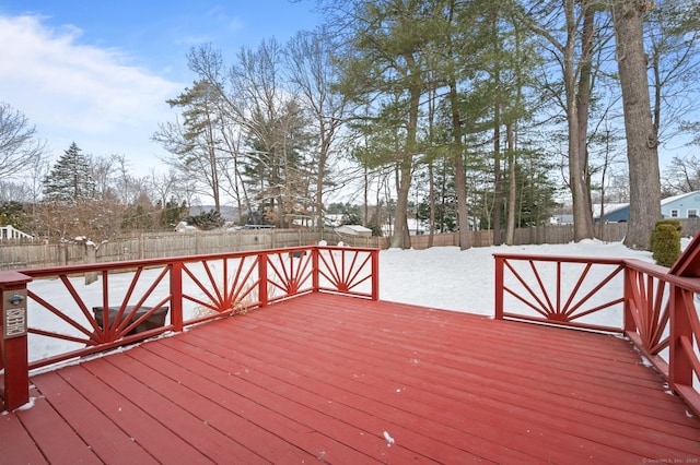 view of snow covered deck