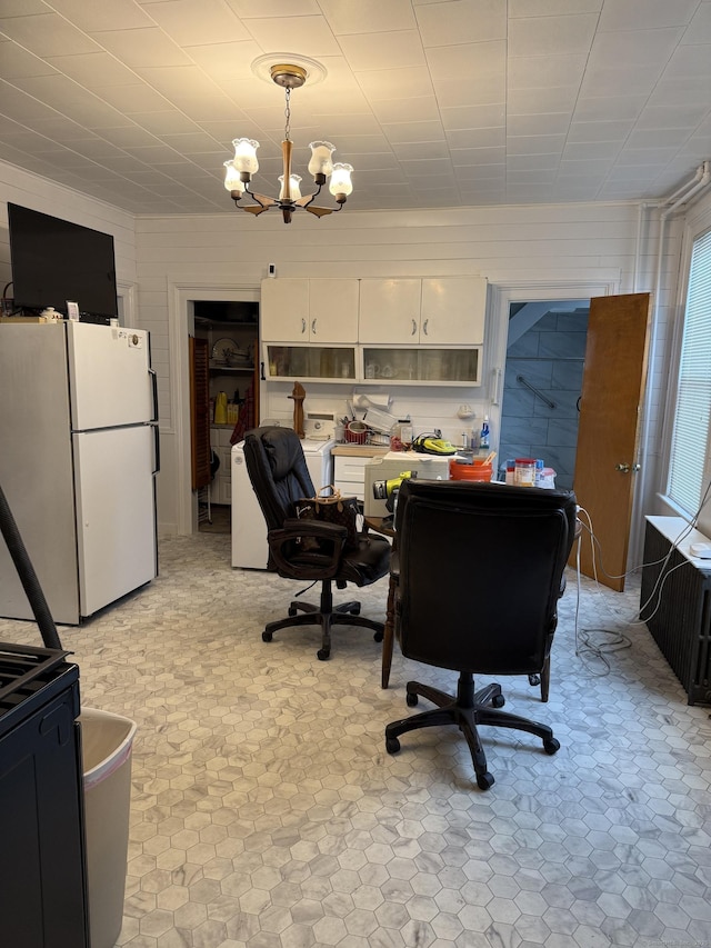 interior space featuring a chandelier
