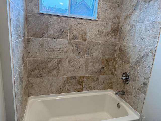 full bath featuring bathing tub / shower combination