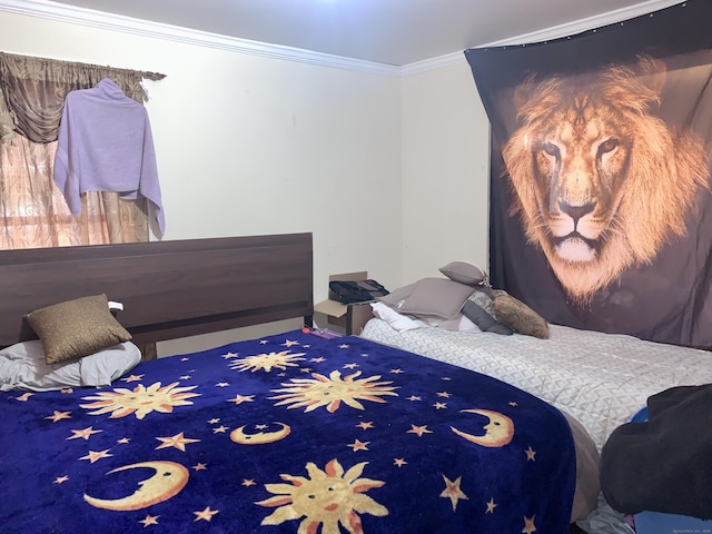 bedroom featuring crown molding