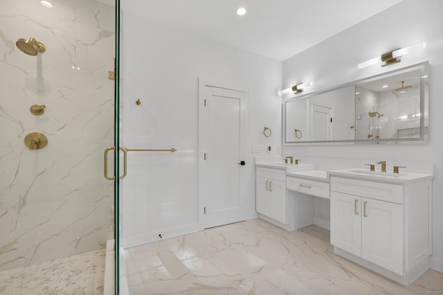 bathroom featuring an enclosed shower and vanity