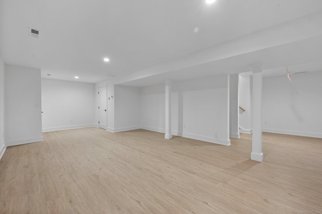 basement with light wood-type flooring