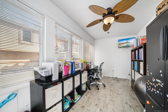 office area with a wealth of natural light and light hardwood / wood-style floors