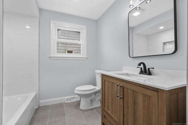 full bathroom with tile patterned flooring, toilet, vanity, and baseboards