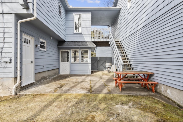 view of patio with stairway