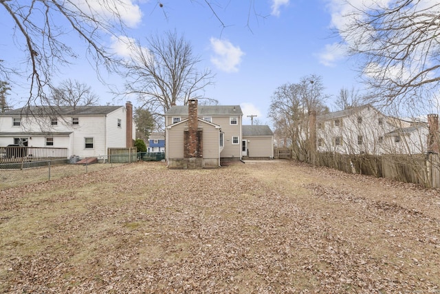 view of yard with a fenced backyard and driveway