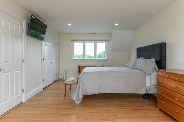 bedroom with light wood-type flooring