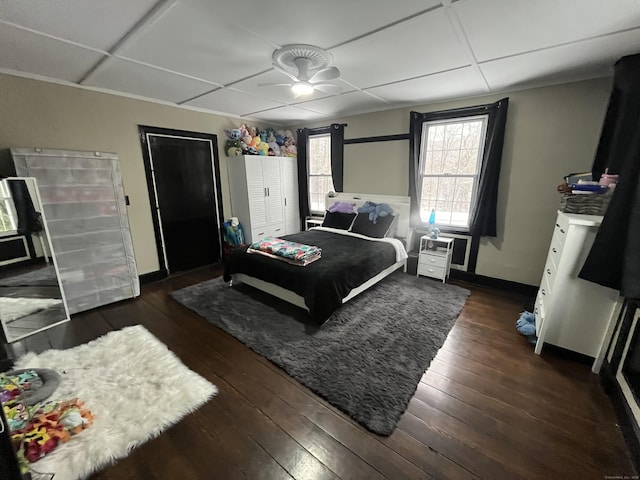 bedroom featuring dark hardwood / wood-style flooring