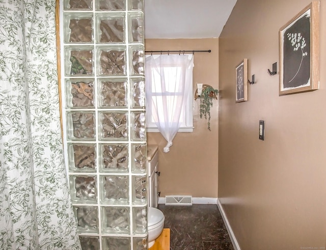 bathroom featuring walk in shower