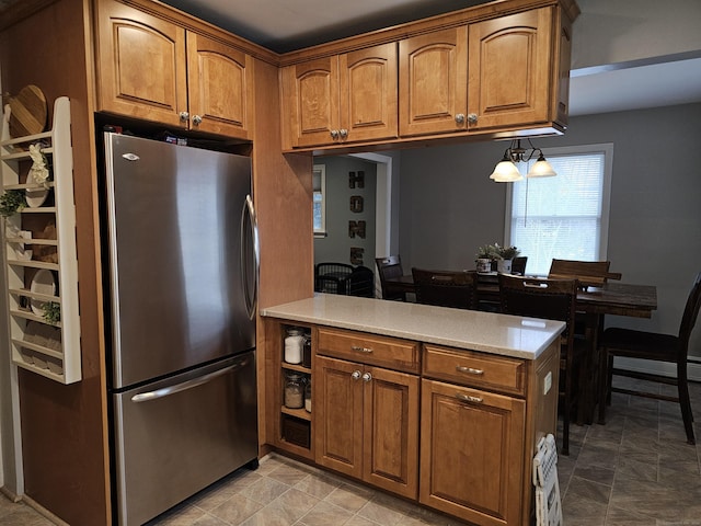 kitchen with stainless steel fridge