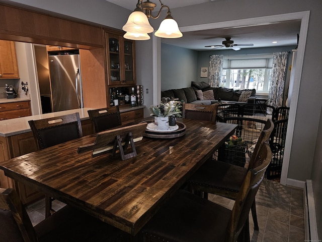 dining room featuring ceiling fan