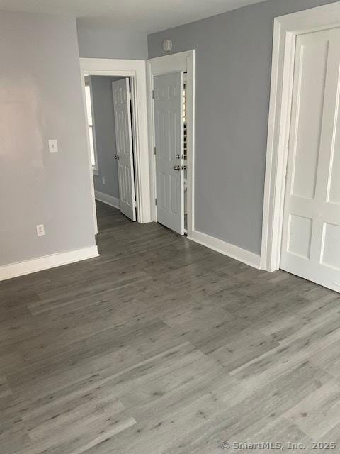 spare room featuring hardwood / wood-style flooring