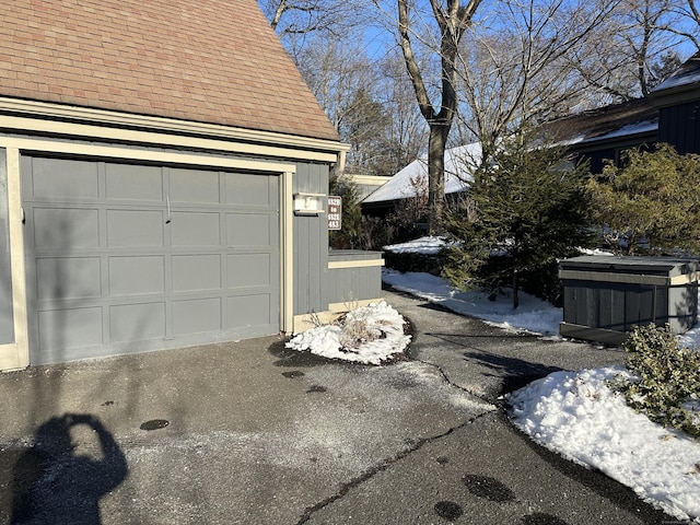 view of snow covered garage