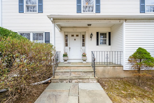 entrance to property with a porch